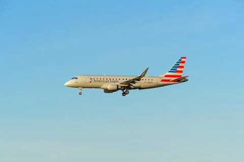 American Eagle Embraer E175 Regional Jet Landing at LAX Airport Stock Photos