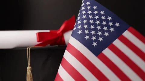 American education and language learning, graduation cap with diploma and f.. Stock Footage 279808690
