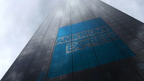 American Express logo on a skyscraper facade reflecting clouds, time lapse Stock Footage 81075585