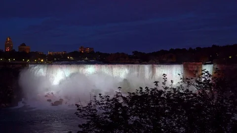 American Falls lit by light at night, Niagara Falls, Ontario, Canada Stock Footage 125223530