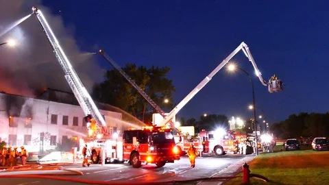 American firetruck at structure fire Stock Footage 115977485
