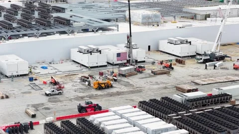 American flag adorns generator unit at data center site in Lancaster, with Stock Footage 337978463
