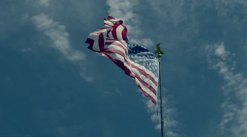 American flag against clouds in sky 库存影片 38586067
