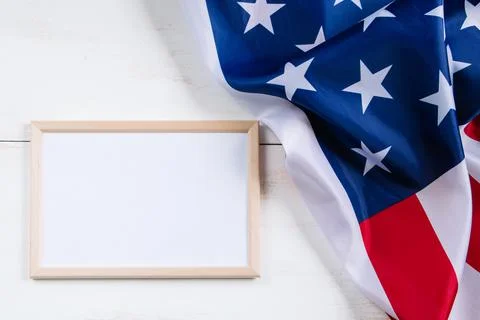 American flag and empty frame for text on white background. Culture of USA. C Stock Photos
