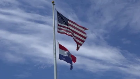 American Flag and Missouri Flag in slow motion Stock Footage