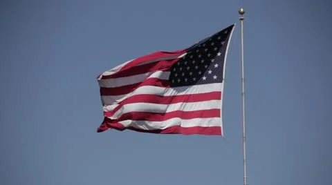 American flag blowing in the wind Vídeo Stock 11235057