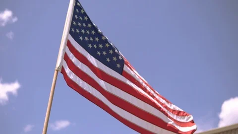 American Flag blowing in the wind. Stock Footage 92854947