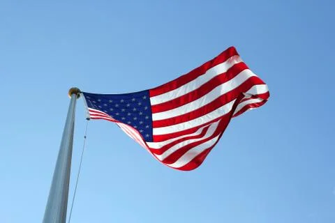 American Flag Blowing in the Wind Stock Photos