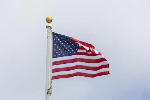 American flag blowing in the wind 写真素材