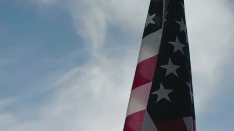 American Flag blowing in wind slow motion cinematic Stock Footage 149764305