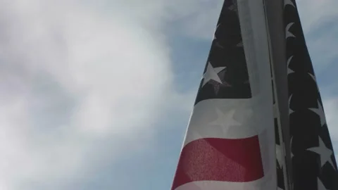 American Flag blowing in wind slow motion cinematic Video stock 149764338