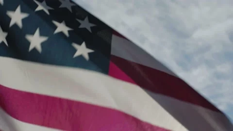 American Flag blowing in wind slow motion cinematic Stock Footage 149764946