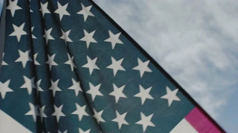 American Flag blowing in wind slow motion cinematic Stock Footage 149764956
