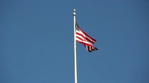American flag with blue sky Stock Footage 12320926