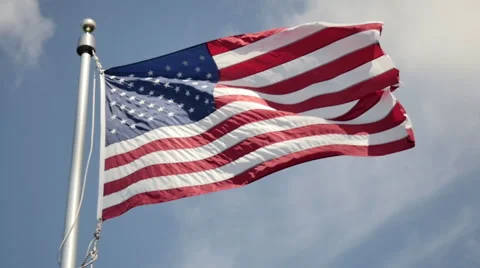 American flag, blue sky. Stock Footage 54688640