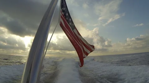 American flag on a boat navigating Stock Footage 68458951