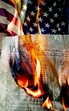 American flag with burning constition Stock Photos
