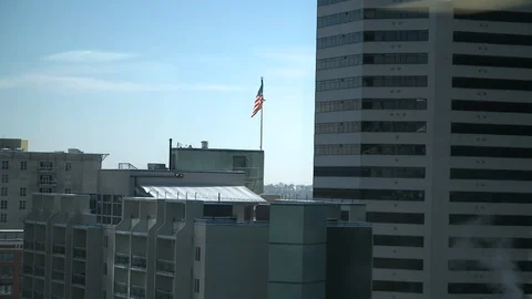 AMERICAN FLAG IN THE CITY Video stock 110777860