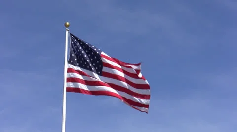 American Flag in Clear Sky Stock Footage 25853236