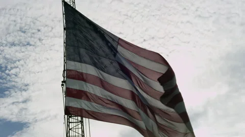American flag close in the breeze on a crane Video stock 40647323