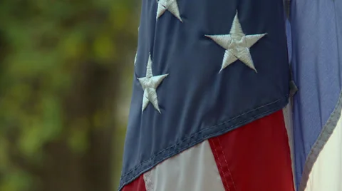 American flag draped close up Stock Footage 32473357