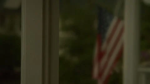 American Flag during Lightning Storm.mp4 Stock Footage 10954311