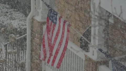 American Flag During Winter Storm Gianna. Strong Snow Blizzard in Winter, G.. Stock-Footage 328032465