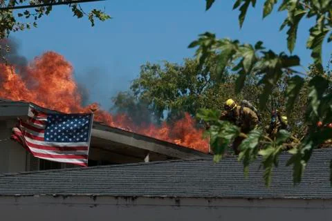 American Flag with Fire Stock Photos