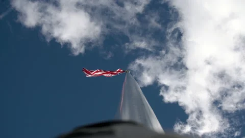American Flag on a flag pole from below Stock Footage 133253009