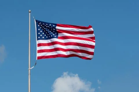 American flag fluttering in the wind Stock Photos