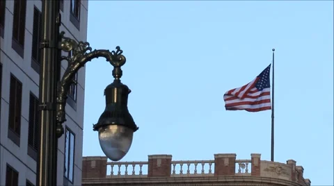 American flag flying on building. Video stock 52033601