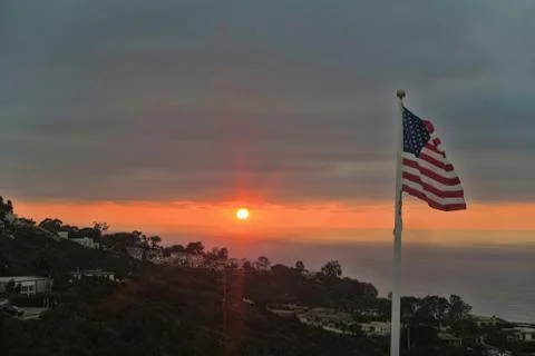 The American flag flying over a mountain Stock Photos