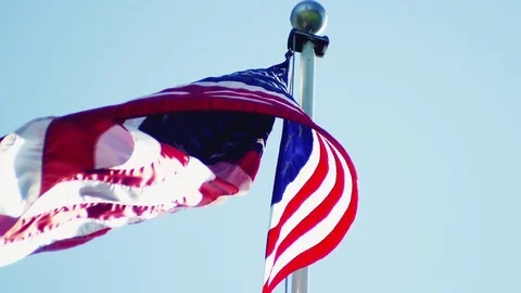 The American Flag Flying in the Wind Stock Footage 75971255
