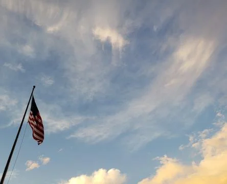 American Flag Flying in The Wind Stock Photos