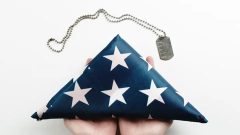 American flag folded into a triangle Stock Footage 194815465