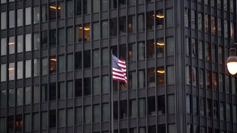 American Flag in front of Dark building. USA flag with stars and stripes Stock Footage 132463508