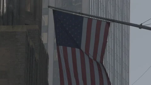 American Flag in front of NYC Skyscraper 4K Video stock 148176923