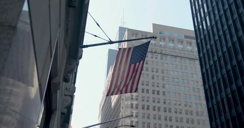 American flag in front the Willis Tower Stock Footage 239098475