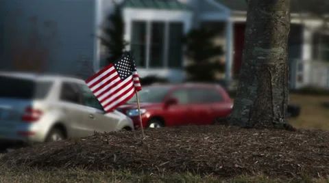 American Flag in Front Yard of House Stock Footage