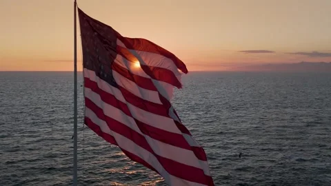The American flag gracefully waves Video stock 270339359