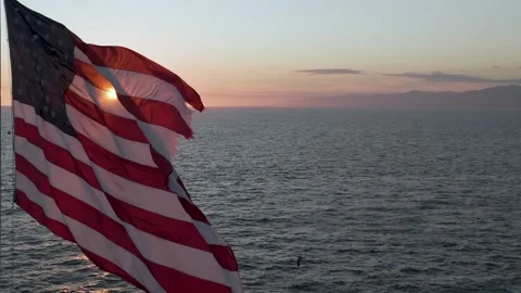 The American flag gracefully waves Video stock 270339360