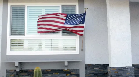 American flag on home Stock Footage 40339774