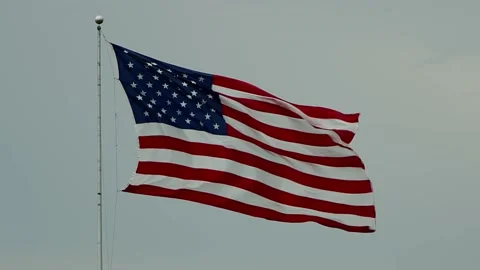American Flag Large Overcast Windy Stock Footage