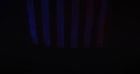 American Flag Low Light Red and Blue Dramatic Lighting Stock Footage 134077757