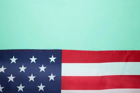 American flag on mint background with copy space Stock Photos