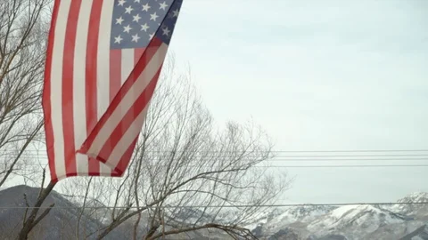American flag with mountains in background Stock Footage 125802464
