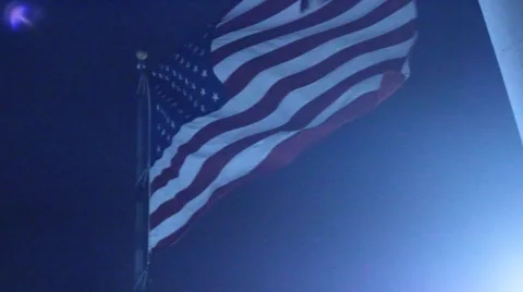 American flag at night low angle light source Stock Footage 47389222