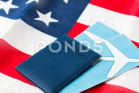 American flag, passport and air tickets Stock Photos