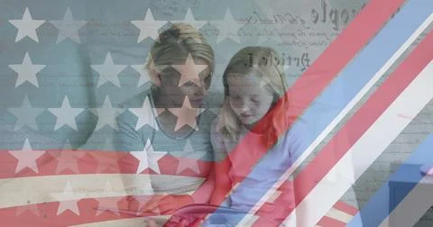 American flag pattern and constitution text against caucasian mother and 写真素材