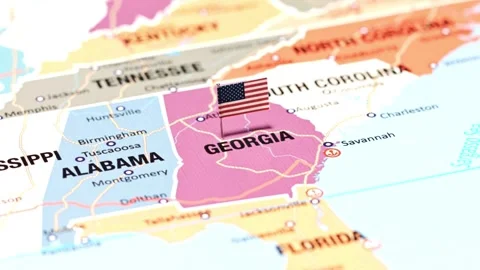 American flag pin on a map of Georgia state Stock-Footage 336398231